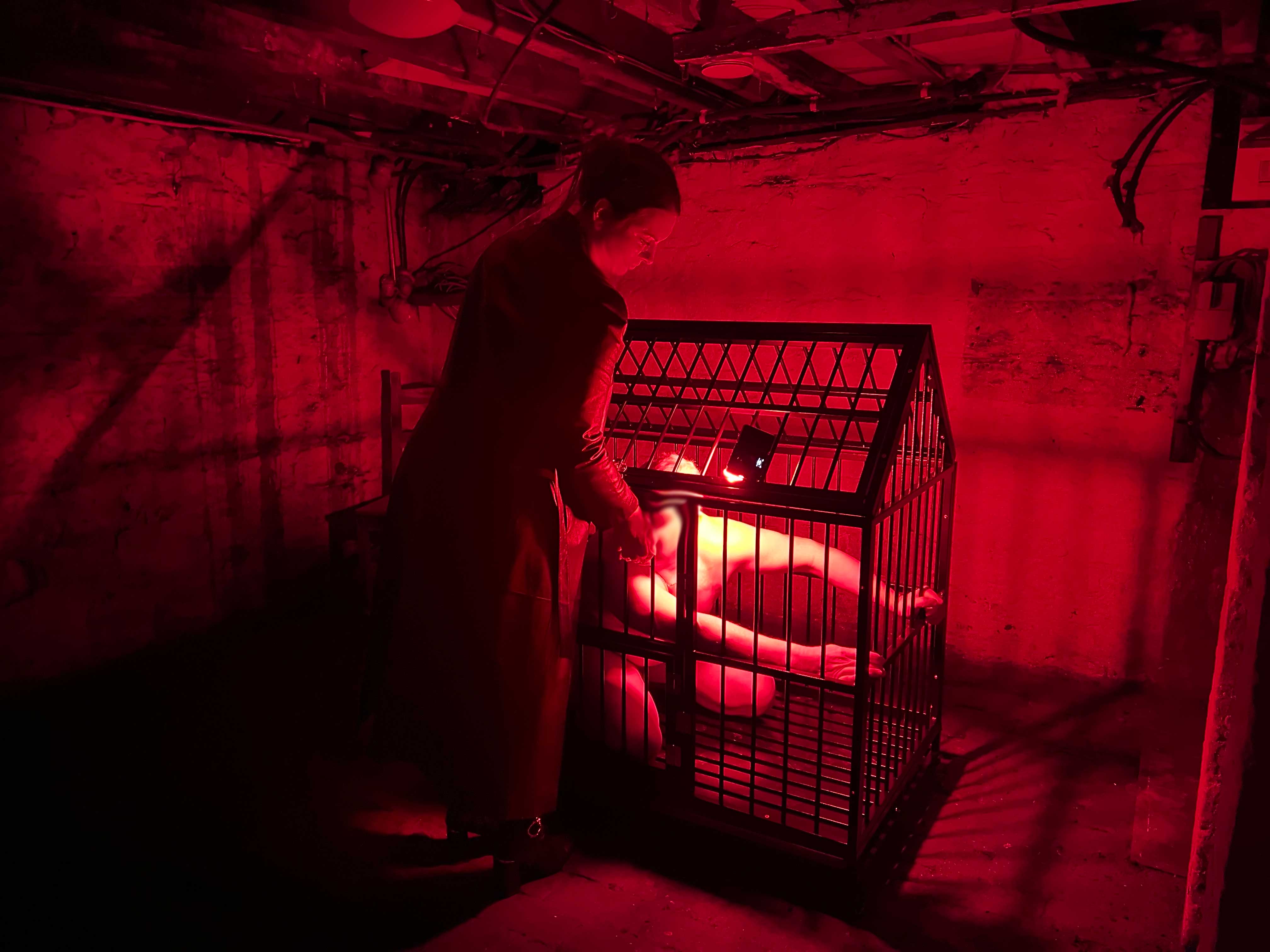 Cage scene from a previous consensual roleplay experience
